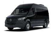 A large black Mercedes-Benz Sprinter van for group and event transportation.