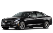 A sleek black Cadillac sedan with chrome accents, ideal for executive transportation.